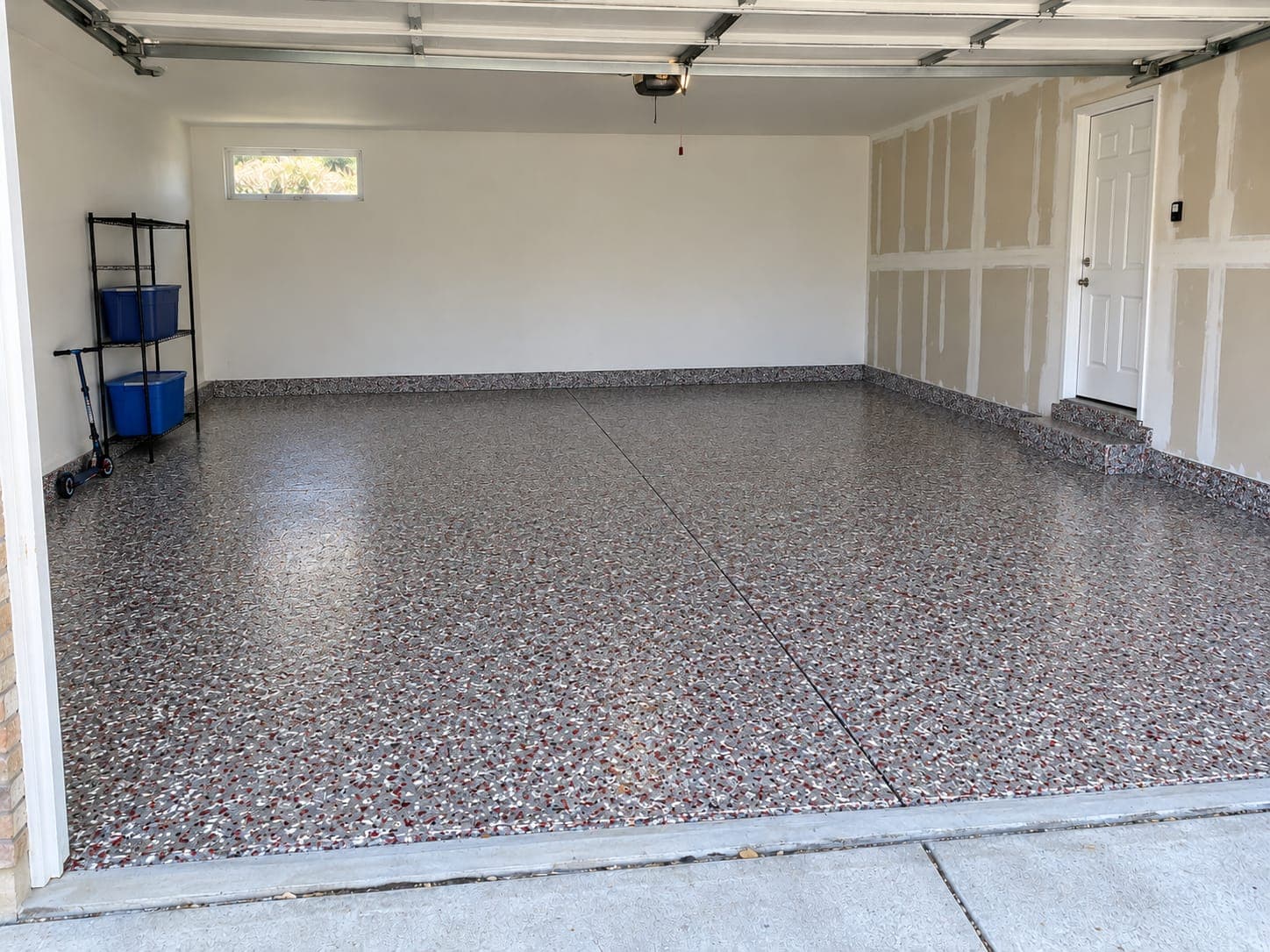 The same garage floor after a full-flake coating