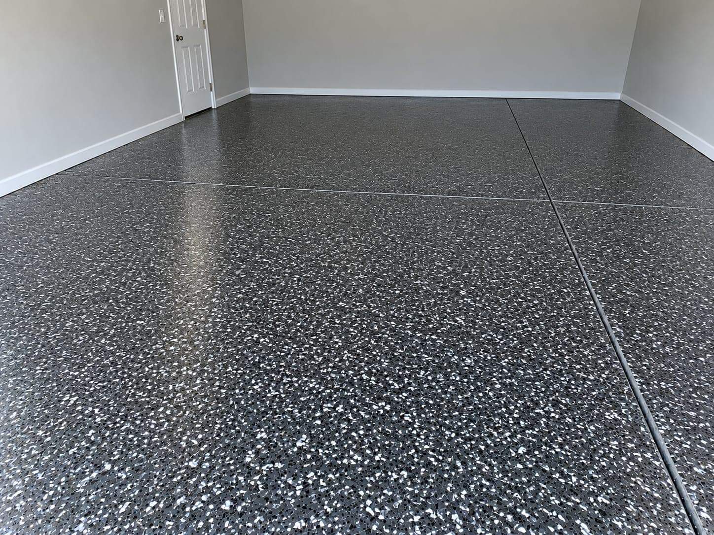 The same garage floor after a full-flake coating