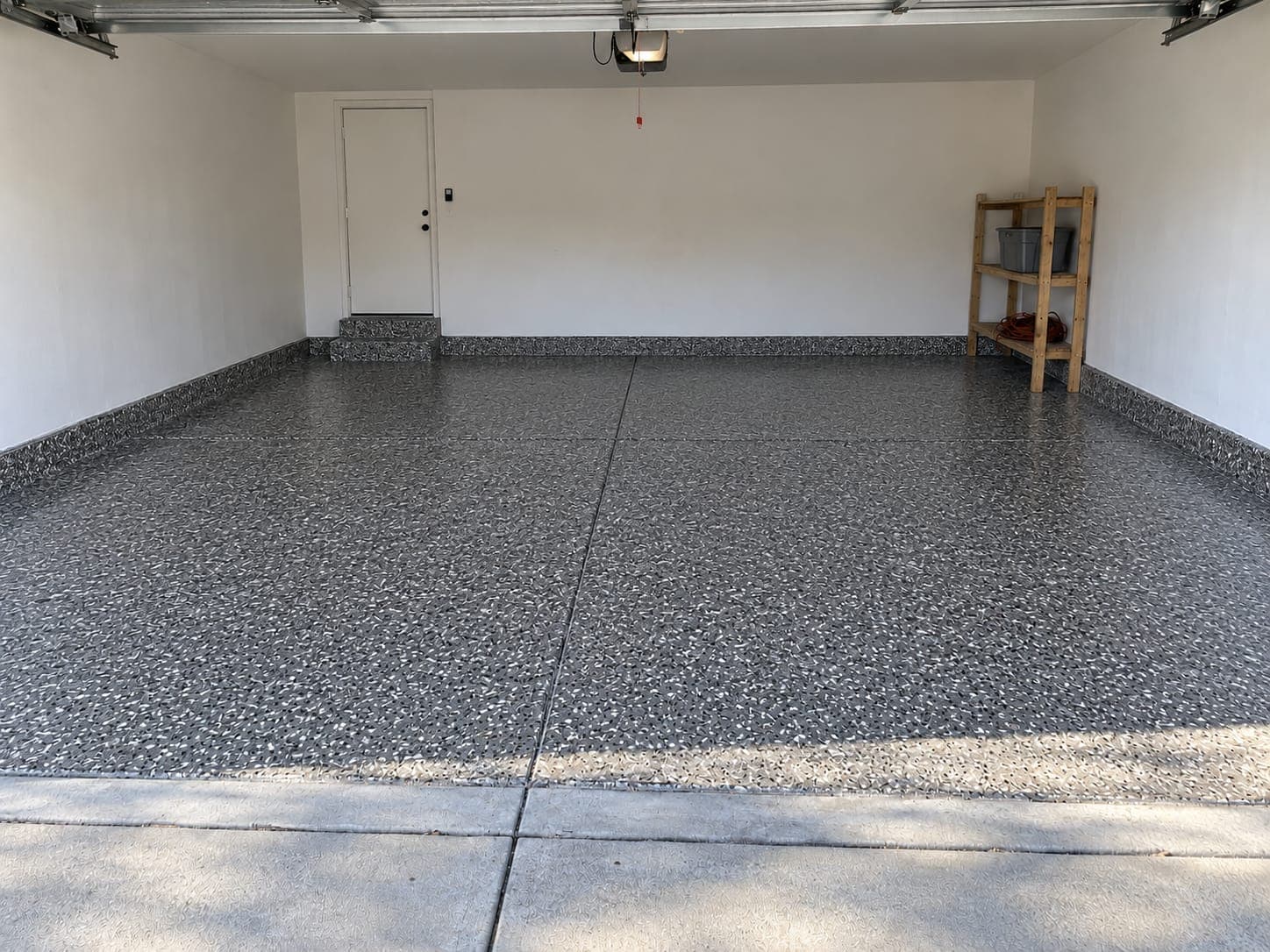 The same garage floor after a full-flake coating