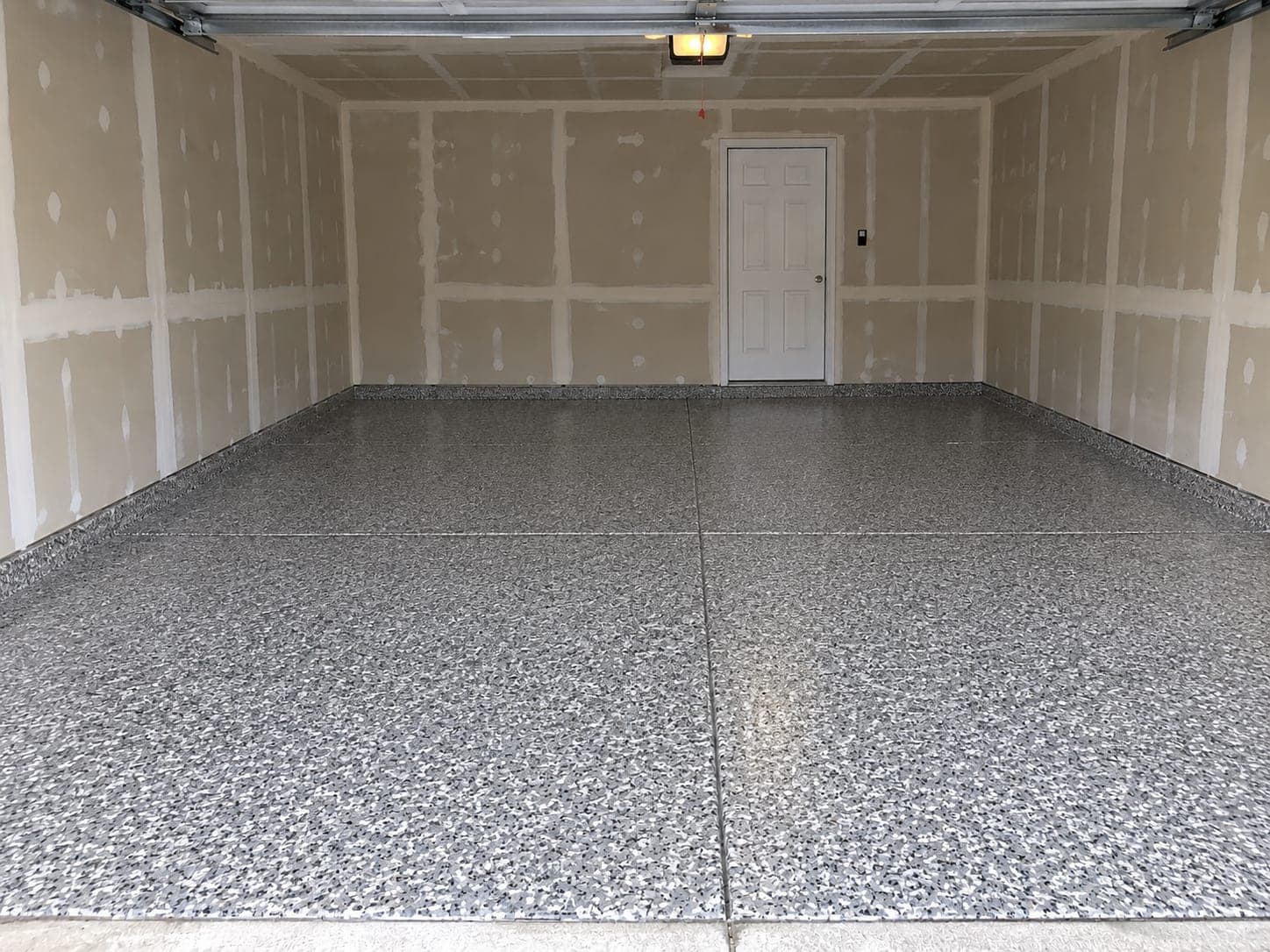 The same Dallas garage after a full-flake floor coating