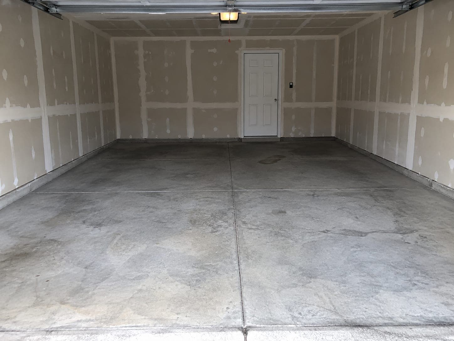 Dallas garage floor before coating: bare concrete