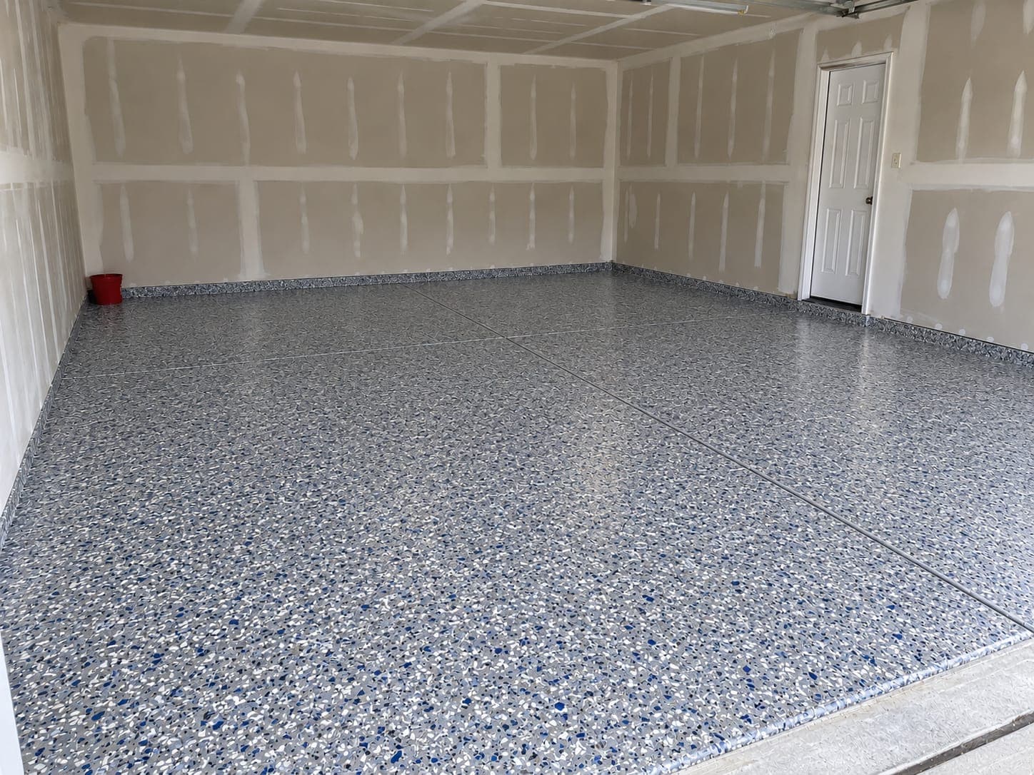 The same garage floor after a full-flake coating