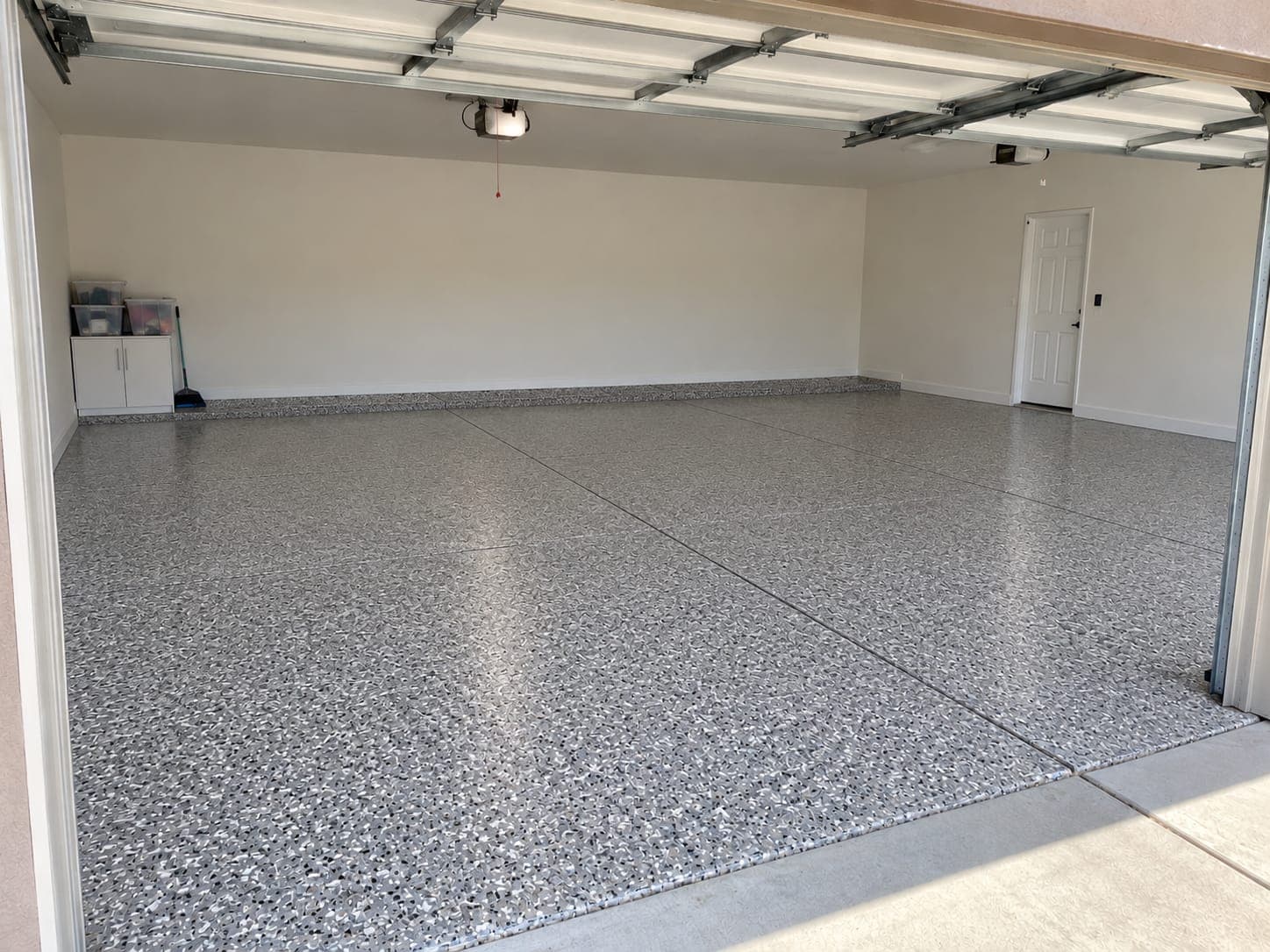 The same garage floor after a full-flake coating