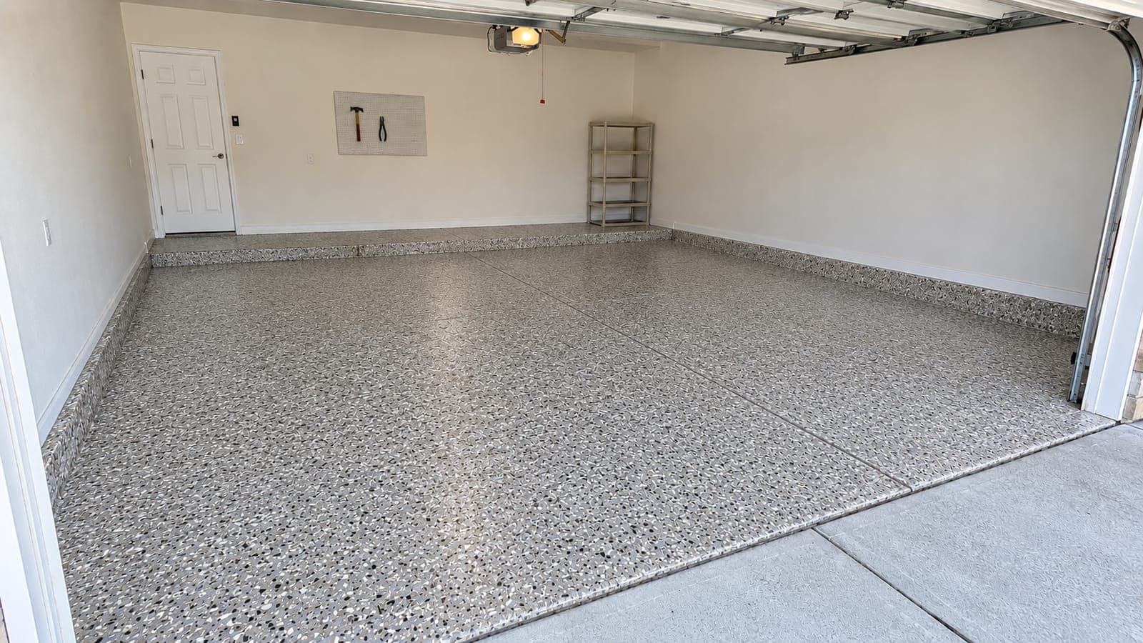 The same garage floor after a full-flake coating
