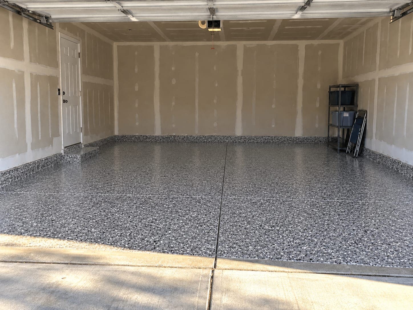 The same garage floor after a full-flake coating