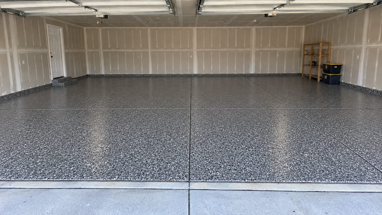 The same garage floor after a full-flake coating